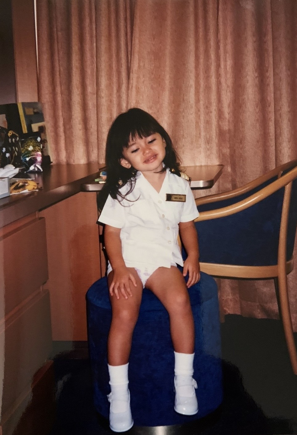 Steve’s daughter Annisa in a shipboard uniform as a young child