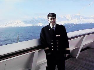 Steve in uniform with an icy landscape beyond the ship