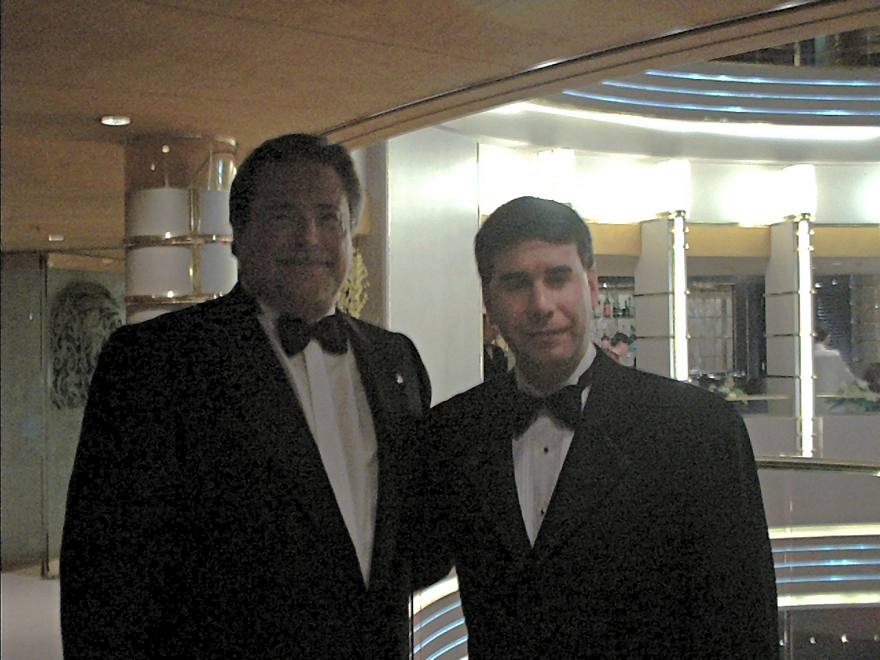Steve with Micky Arison aboard a cruise ship
