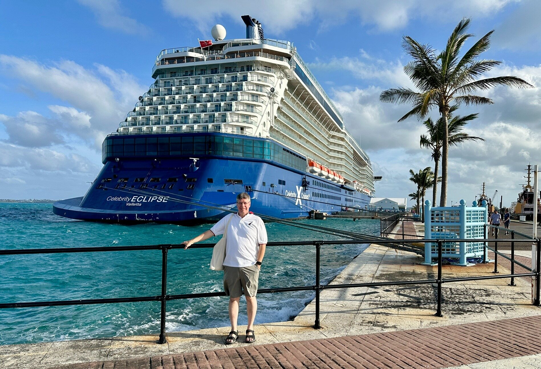 Steve beside a modern ocean cruise ship