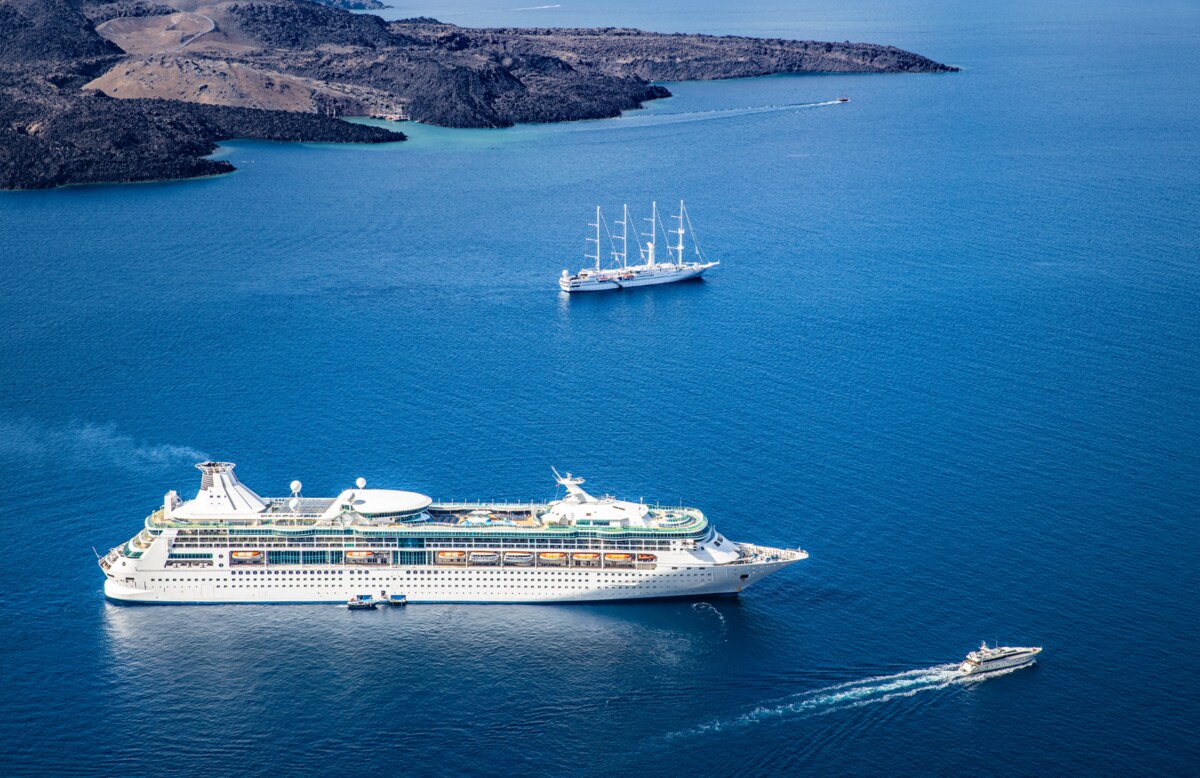 Cruise ships sailing through the deep blue waters of the Mediterranean
